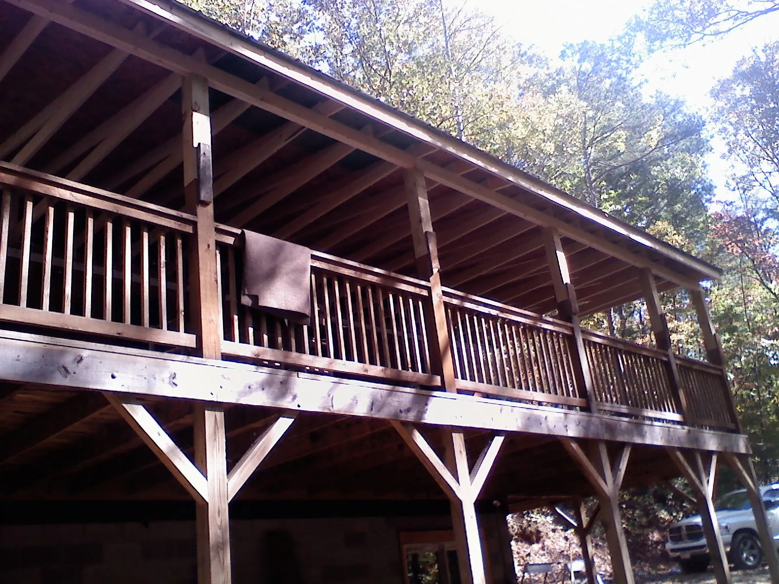 Timber framing under a new elevated porch and deck — Roof Leak Repair in Rhodes by Roofing Brothers